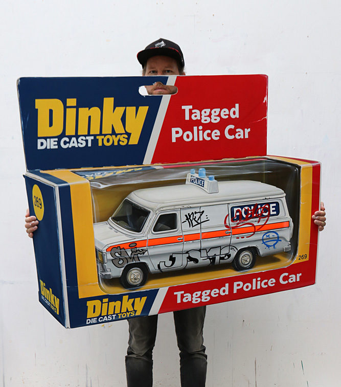 Tagged Police Car Glorify by Leon Keer